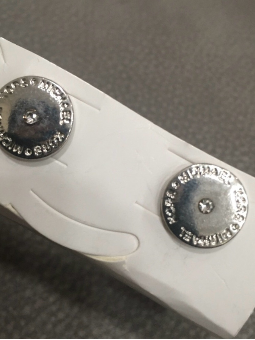 MK button earrings silver